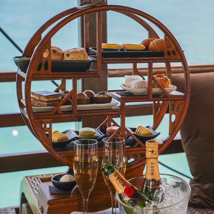 best new and seasonal afternoon teas in hong kong: aqua luna easter afternoon tea with dim sum on a junk