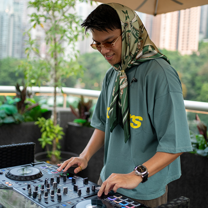 dj pao reggy performing at an outdoor venue, hire dj pao reggy for junk parties and beach parties